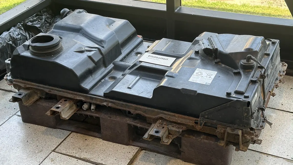 Lithium-ion battery pack from an electric car, displayed on a pallet