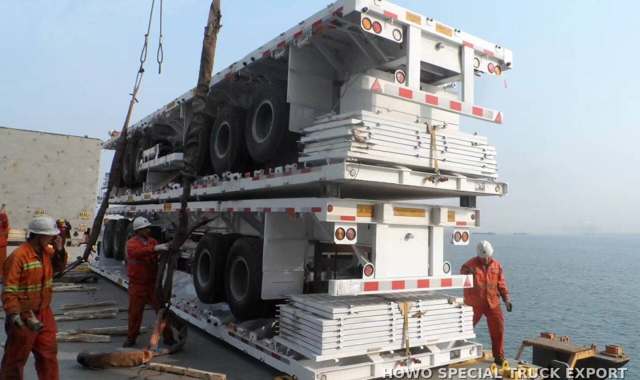 Semi-remorque plateau porte-conteneurs 2 essieux 20 ft 2 AXLE 20FT FLATBED CONTAINER TRAILER — traitement anticorrosion par cire et préparation pour l’expédition maritime en RORO