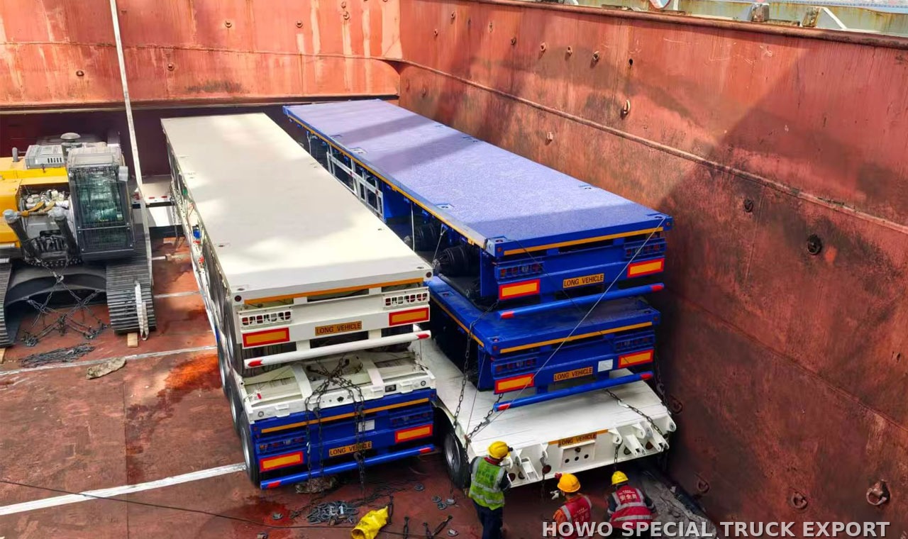 Semi-remorque plateau porte-conteneurs 3 essieux 40 ft 3 AXLE 40FT FLATBED CONTAINER TRAILER — traitement anticorrosion par cire et préparation pour l’expédition maritime en RORO