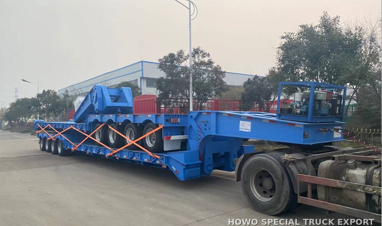 Semi-remorque porte-engins col de cygne démontable hydraulique 3 essieux 80 t 3 AXLE 80TON LOWBOY TRAILER — traitement anticorrosion par cire et préparation pour l’expédition maritime en RORO